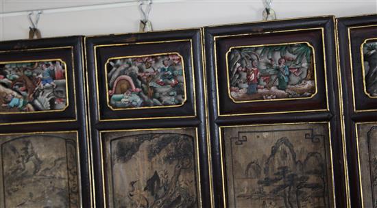 A Chinese 12 panel polychrome and gilt wood screen, 19th century, 274cm x 118cm, hinges removed for hanging